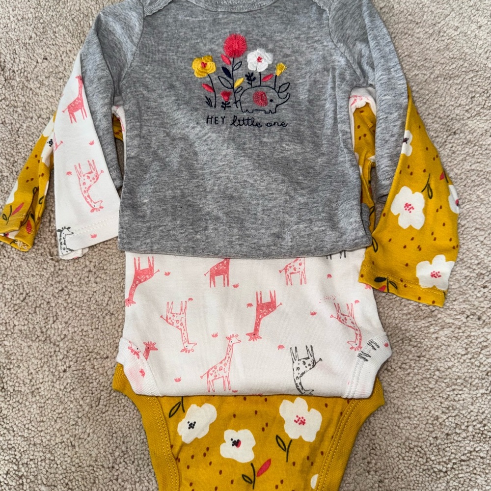 Brand new 3 piece onesie set.